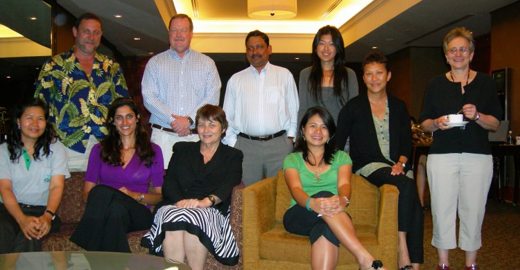 Dr. John Reynolds, standing second from the left, pictured in a group photo with expert colleagues who participated in a Strategic Dugong Survey Design Workshop in Singapore in 2010.
